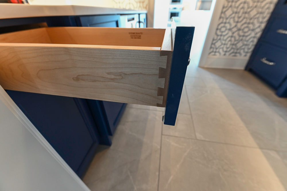 Gemcraft Navy Blue Pantry with White Quartz Countertops and Sub-Zero Tall Wine Cooler