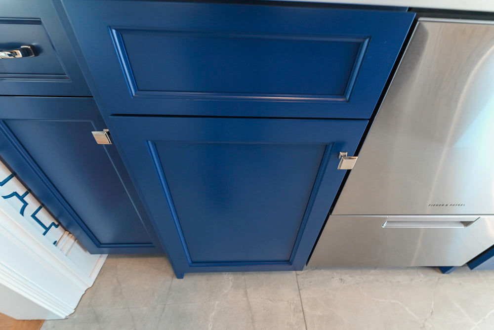 Gemcraft Navy Blue Pantry with White Quartz Countertops and Sub-Zero Tall Wine Cooler
