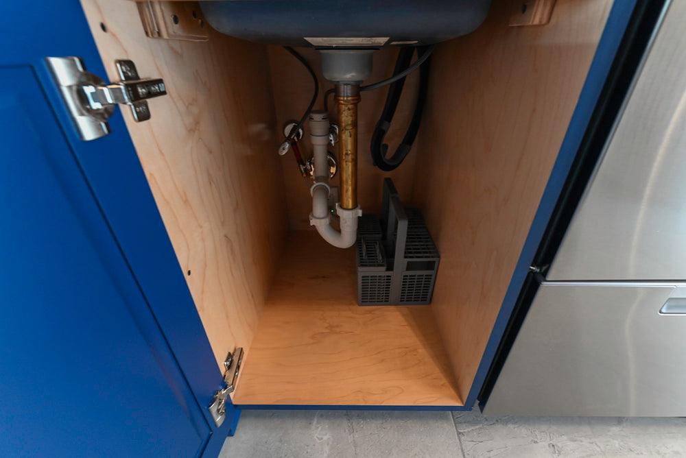 Gemcraft Navy Blue Pantry with White Quartz Countertops and Sub-Zero Tall Wine Cooler