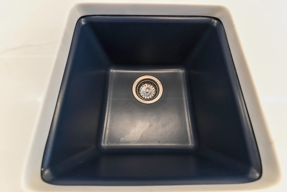 Gemcraft Navy Blue Pantry with White Quartz Countertops and Sub-Zero Tall Wine Cooler