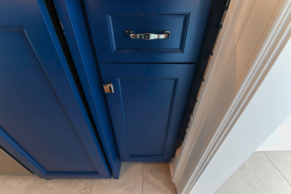 Gemcraft Navy Blue Pantry with White Quartz Countertops and Sub-Zero Tall Wine Cooler