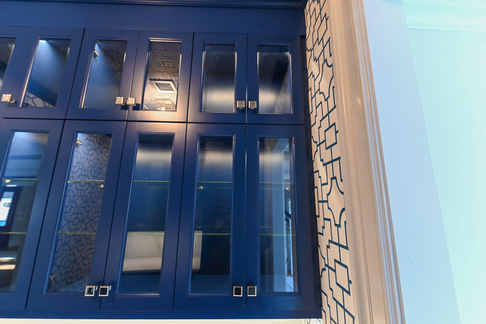 Gemcraft Navy Blue Pantry with White Quartz Countertops and Sub-Zero Tall Wine Cooler