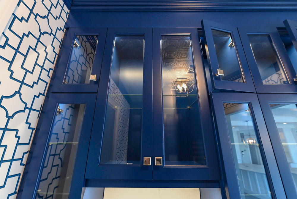 Gemcraft Navy Blue Pantry with White Quartz Countertops and Sub-Zero Tall Wine Cooler
