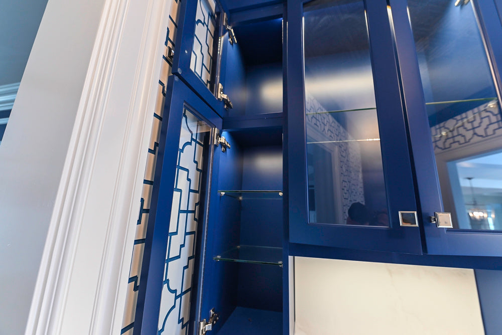 Gemcraft Navy Blue Pantry with White Quartz Countertops and Sub-Zero Tall Wine Cooler