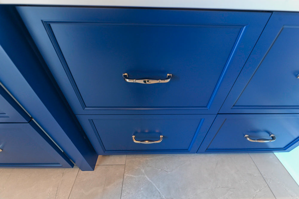 Gemcraft Navy Blue Pantry with White Quartz Countertops and Sub-Zero Tall Wine Cooler