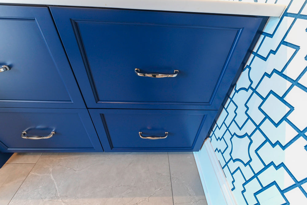 Gemcraft Navy Blue Pantry with White Quartz Countertops and Sub-Zero Tall Wine Cooler