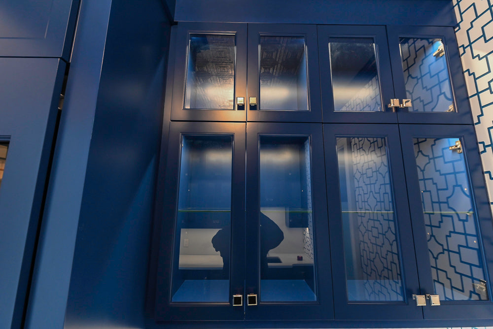 Gemcraft Navy Blue Pantry with White Quartz Countertops and Sub-Zero Tall Wine Cooler