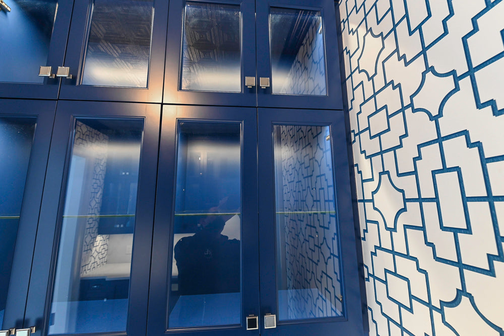 Gemcraft Navy Blue Pantry with White Quartz Countertops and Sub-Zero Tall Wine Cooler