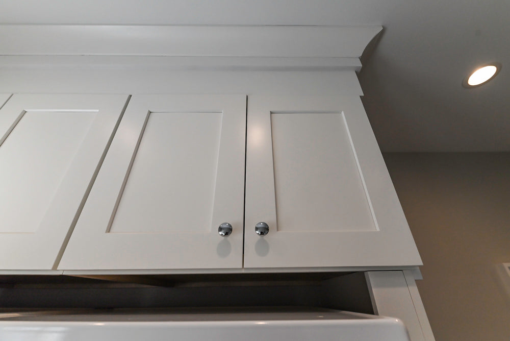 Traditional White Laundry Area with Sink, Faucet and Marble Countertops