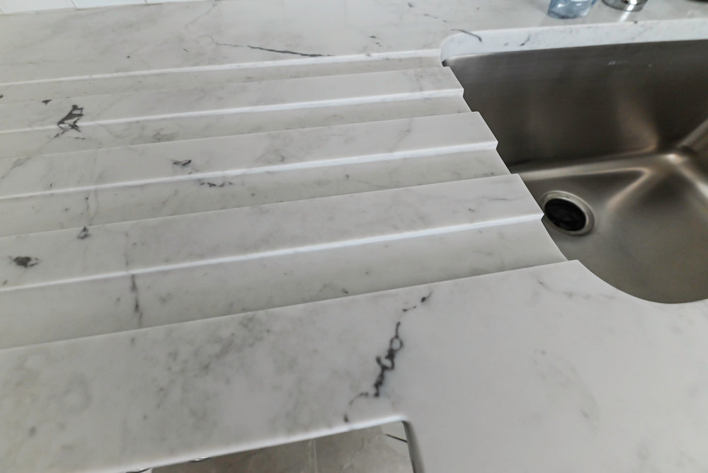 Traditional White Laundry Area with Sink, Faucet and Marble Countertops