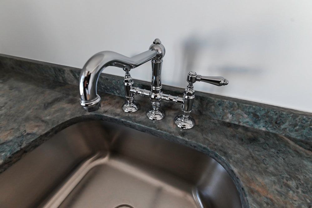 Traditional White Wet Bar with Granite Countertops and Beverage Center