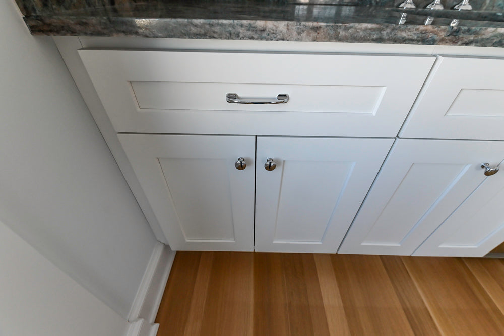 Traditional White Wet Bar with Granite Countertops and Beverage Center