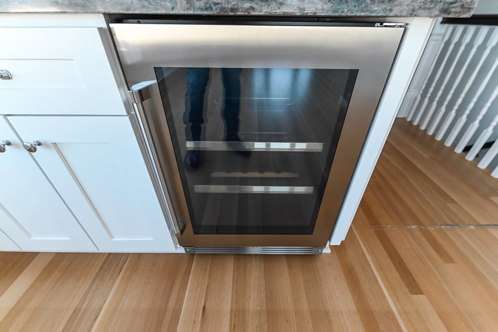 Traditional White Wet Bar with Granite Countertops and Beverage Center