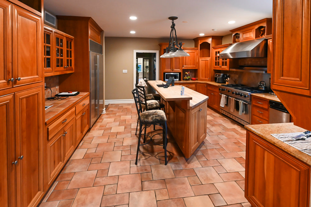 Traditional Wooden Kitchen with Island and Appliances featuring 48" Viking Range
