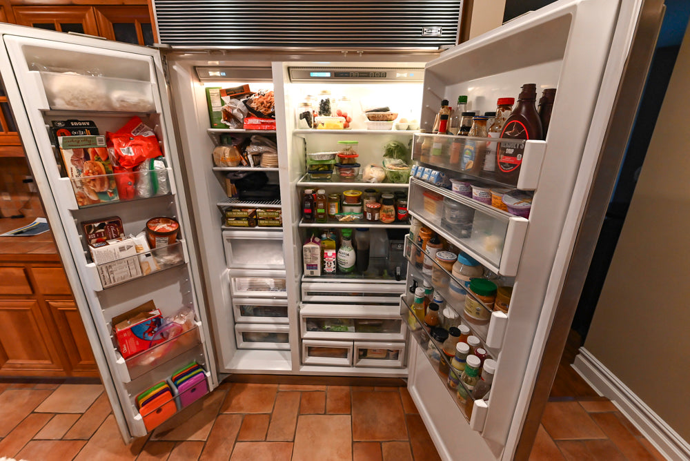 Traditional Wooden Kitchen with Island and Appliances featuring 48" Viking Range