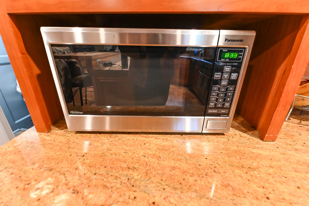 Traditional Wooden Kitchen with Island and Appliances featuring 48" Viking Range