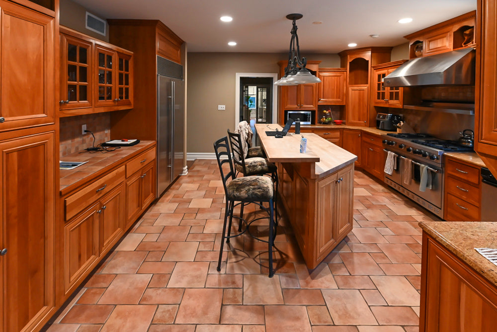 Traditional Wooden Kitchen with Island and Appliances featuring 48" Viking Range