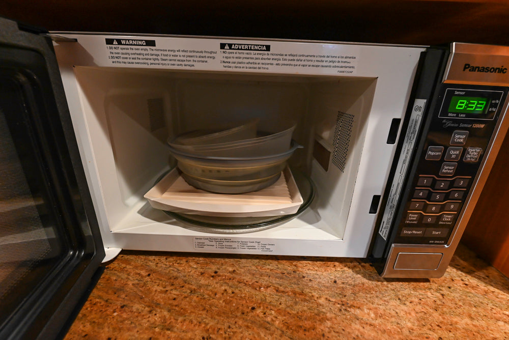 Traditional Wooden Kitchen with Island and Appliances featuring 48" Viking Range