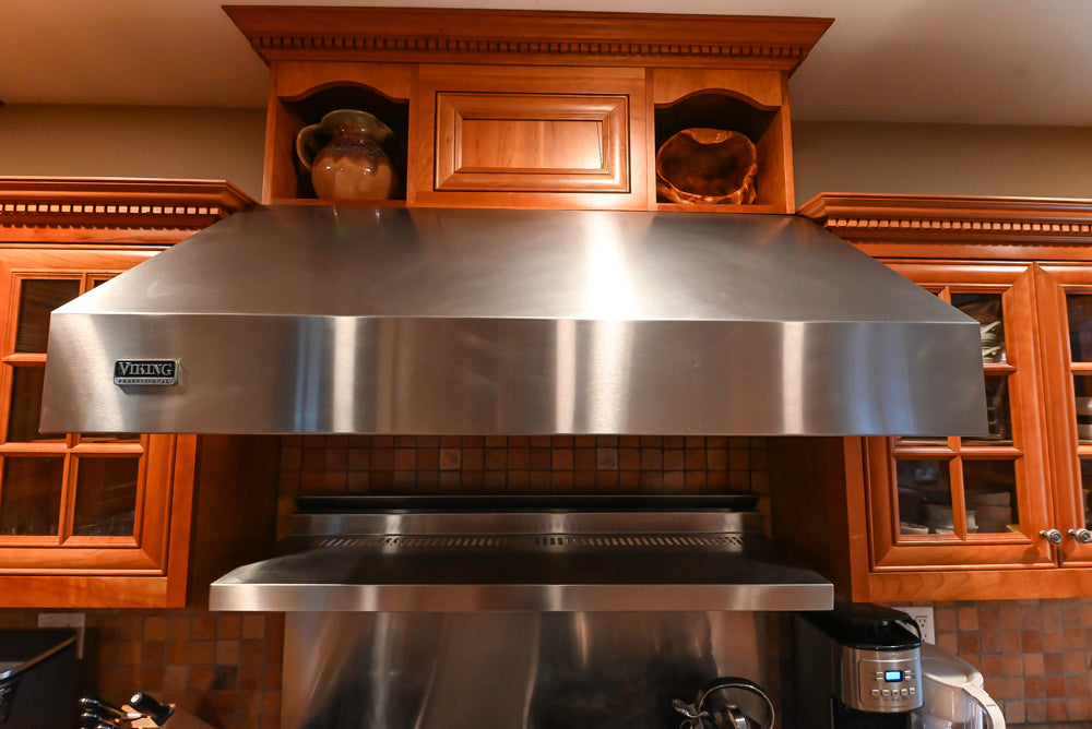 Traditional Wooden Kitchen with Island and Appliances featuring 48" Viking Range