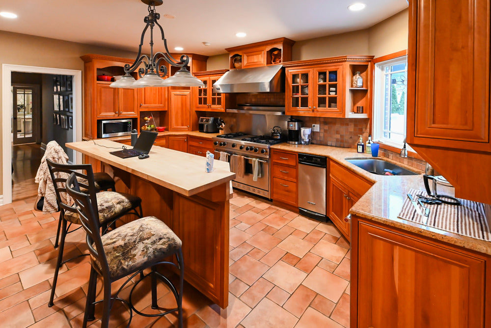 Traditional Wooden Kitchen with Island and Appliances featuring 48" Viking Range