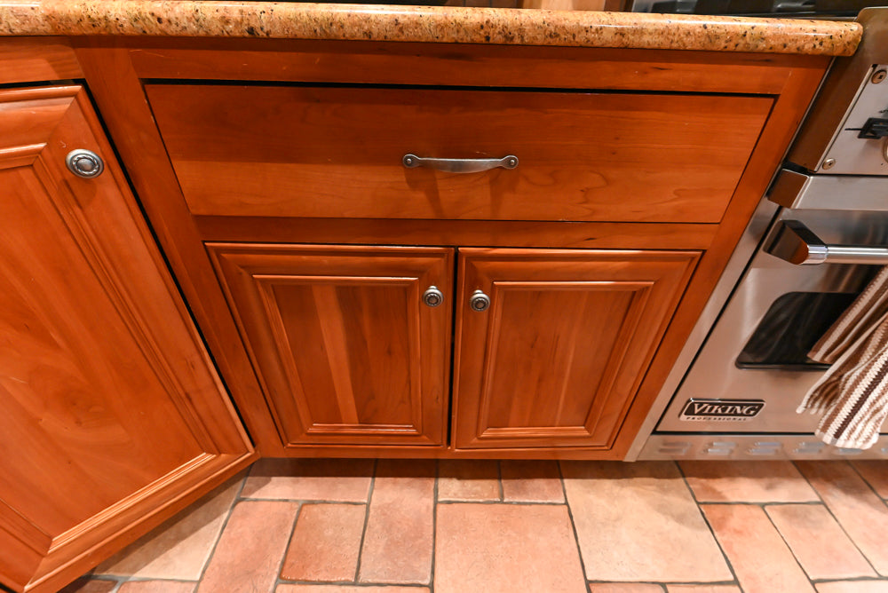 Traditional Wooden Kitchen with Island and Appliances featuring 48" Viking Range
