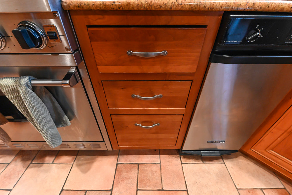 Traditional Wooden Kitchen with Island and Appliances featuring 48" Viking Range