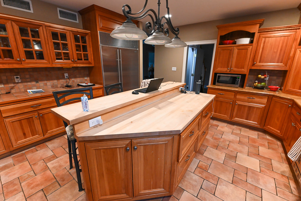 Traditional Wooden Kitchen with Island and Appliances featuring 48" Viking Range