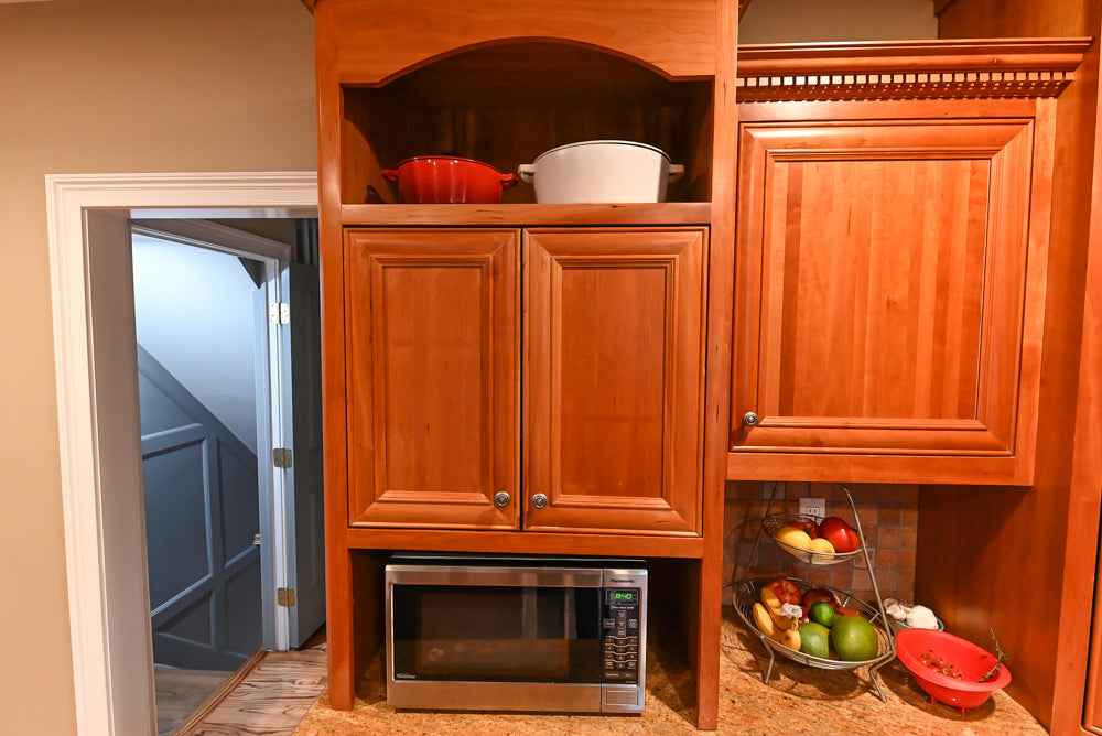 Traditional Wooden Kitchen with Island and Appliances featuring 48" Viking Range