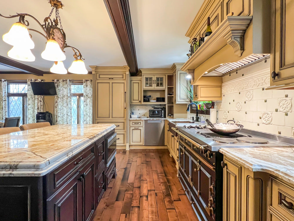 Traditional Creamy Brown Kitchen with Island, Marble Countertops and Appliances