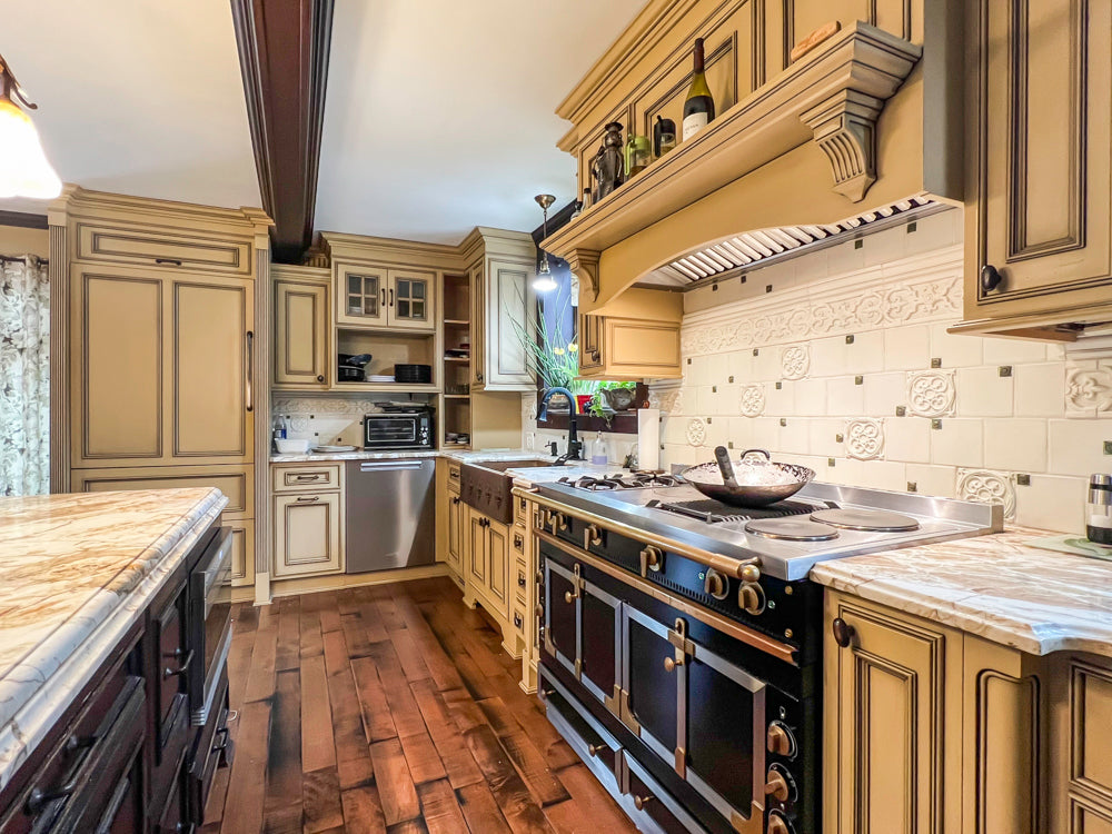 Traditional Creamy Brown Kitchen with Island, Marble Countertops and Appliances