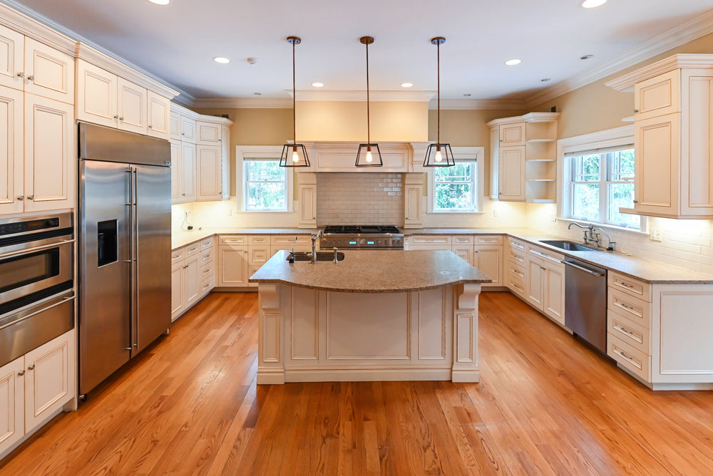 Traditional Cream Kitchen with Island, Granite Countertops & 48" Thermador Range