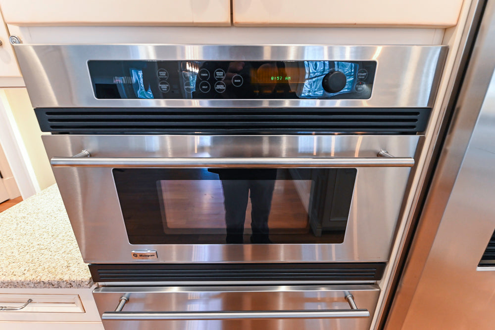 Traditional Cream Kitchen with Island, Granite Countertops & 48" Thermador Range