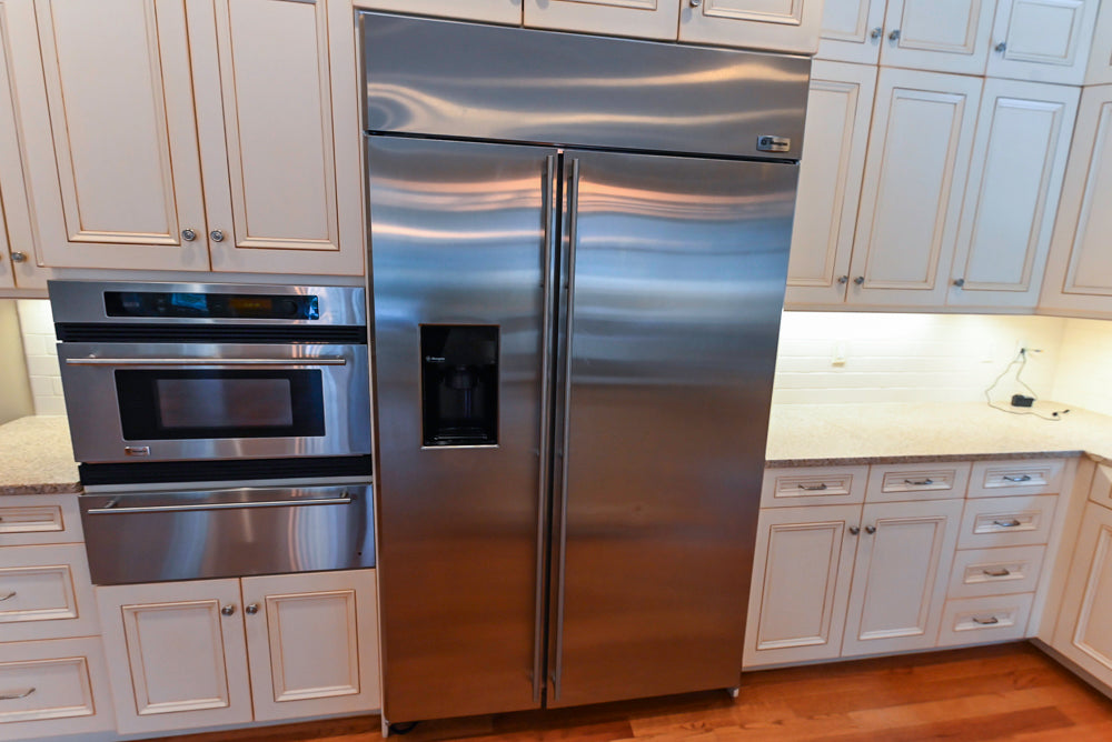 Traditional Cream Kitchen with Island, Granite Countertops & 48" Thermador Range