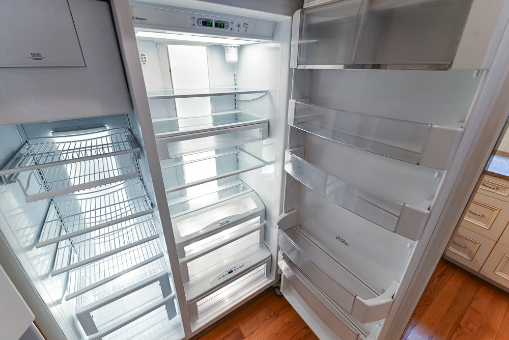 Traditional Cream Kitchen with Island, Granite Countertops & 48" Thermador Range
