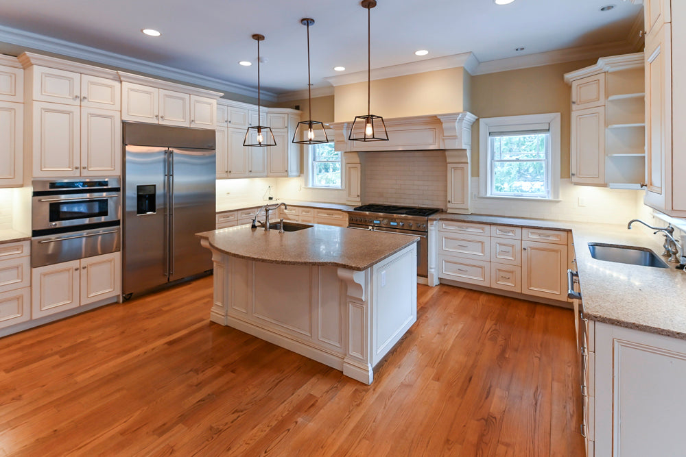 Traditional Cream Kitchen with Island, Granite Countertops & 48" Thermador Range