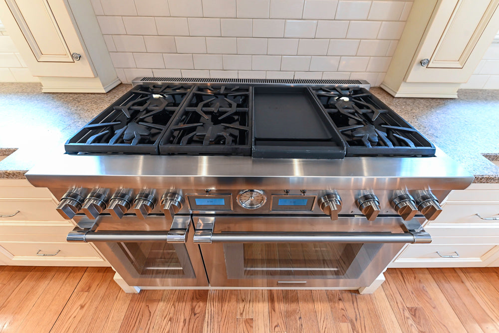 Traditional Cream Kitchen with Island, Granite Countertops & 48" Thermador Range