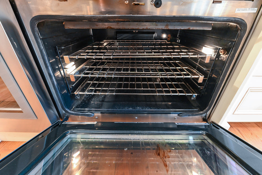 Traditional Cream Kitchen with Island, Granite Countertops & 48" Thermador Range
