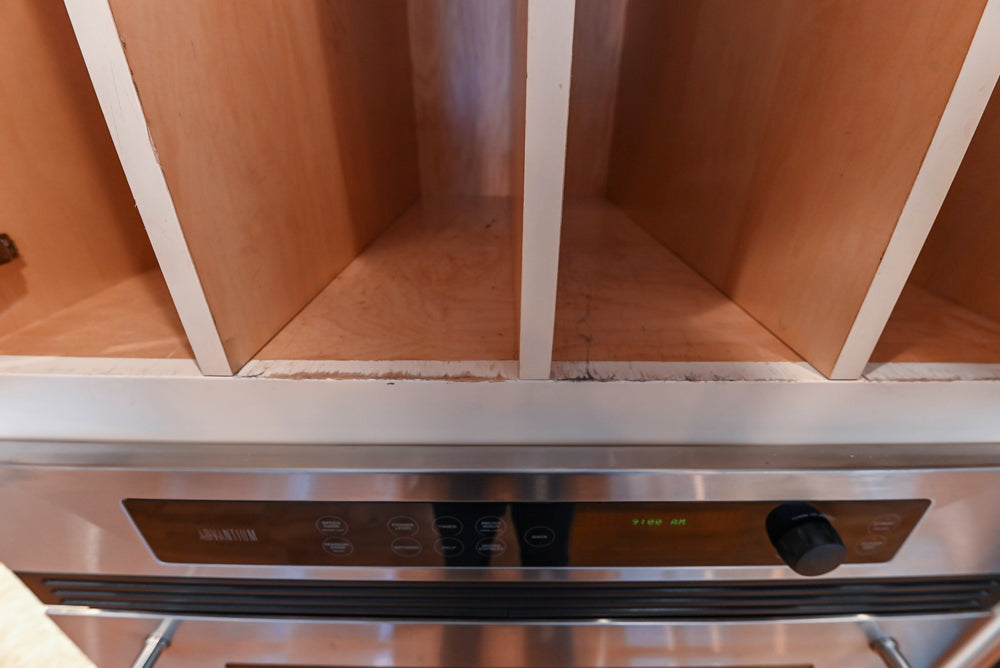 Traditional Cream Kitchen with Island, Granite Countertops & 48" Thermador Range