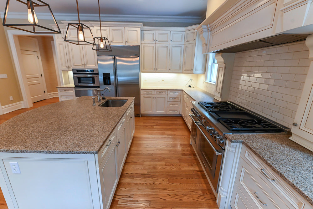 Traditional Cream Kitchen with Island, Granite Countertops & 48" Thermador Range