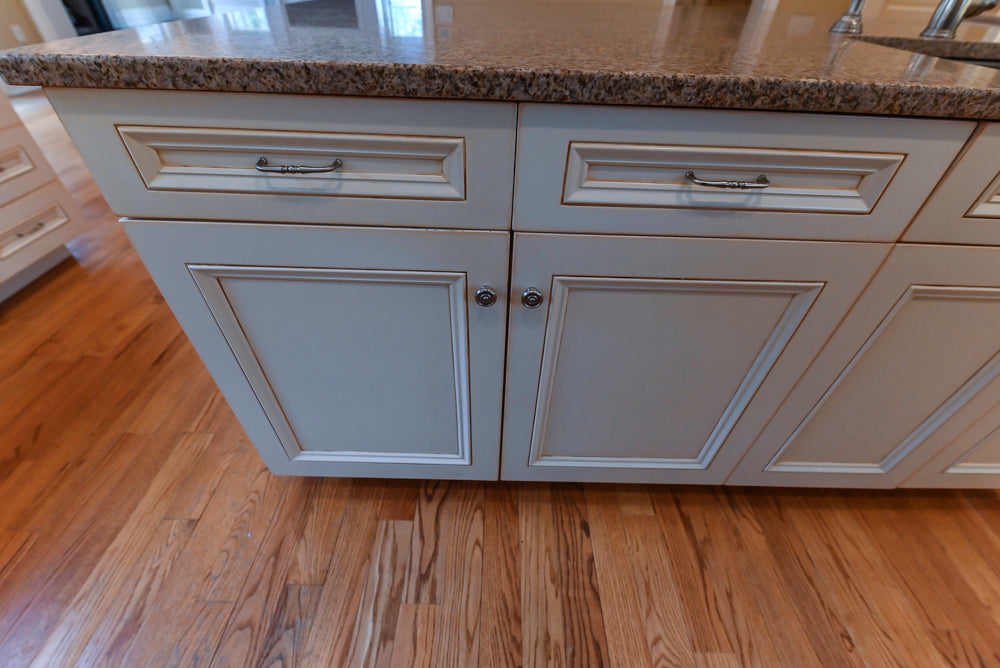 Traditional Cream Kitchen with Island, Granite Countertops & 48" Thermador Range