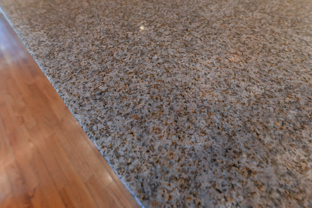 Traditional Cream Kitchen with Island, Granite Countertops & 48" Thermador Range