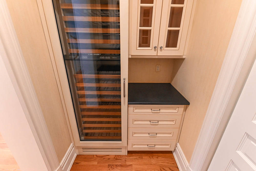 Traditional Cream Butler's Pantry with Sub-Zero Tall Wine Cooler