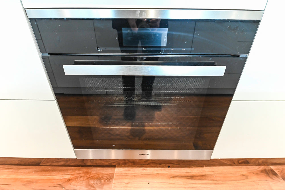 Modern Matte White Kitchen with Waterfall Island, Quartz Countertops & Miele Appliances