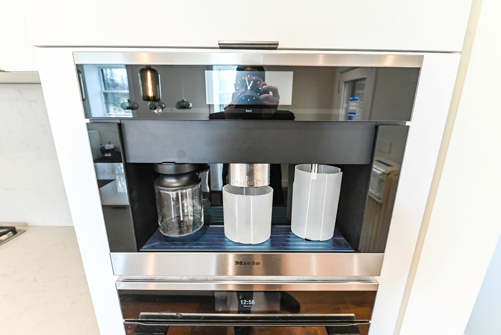 Modern Matte White Kitchen with Waterfall Island, Quartz Countertops & Miele Appliances