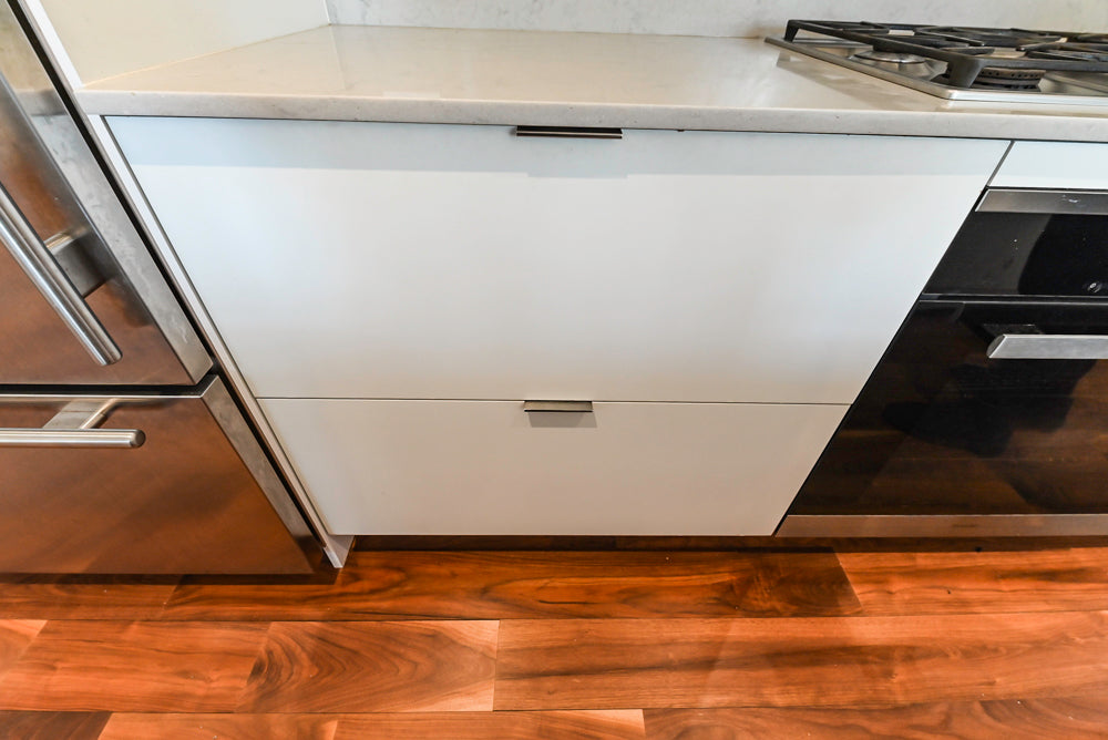 Modern Matte White Kitchen with Waterfall Island, Quartz Countertops & Miele Appliances