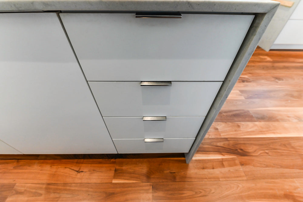 Modern Matte White Kitchen with Waterfall Island, Quartz Countertops & Miele Appliances
