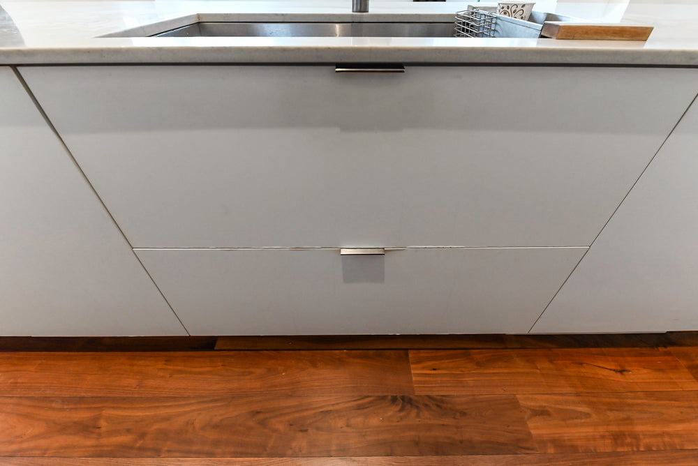 Modern Matte White Kitchen with Waterfall Island, Quartz Countertops & Miele Appliances