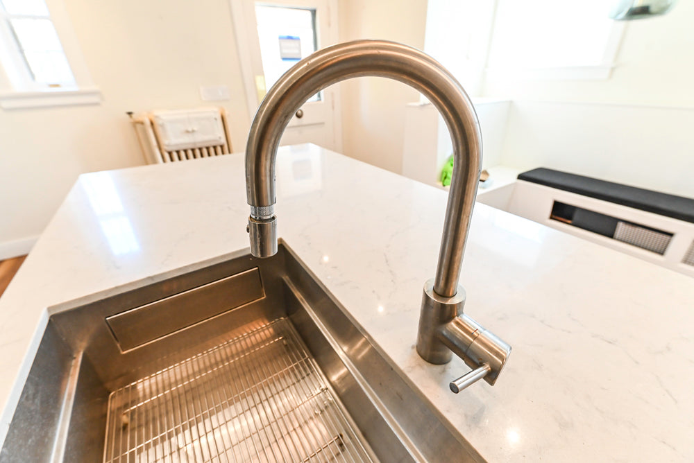 Modern Matte White Kitchen with Waterfall Island, Quartz Countertops & Miele Appliances