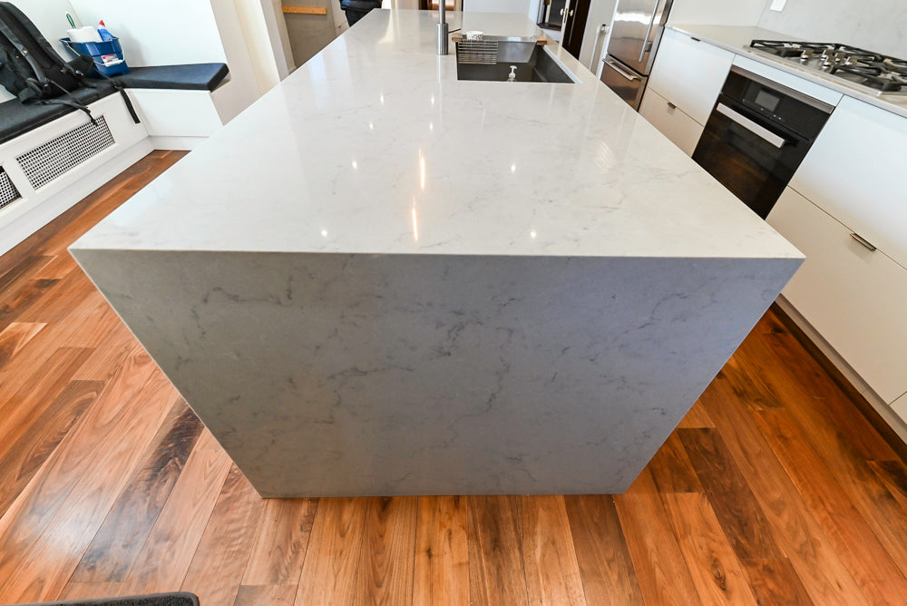 Modern Matte White Kitchen with Waterfall Island, Quartz Countertops & Miele Appliances