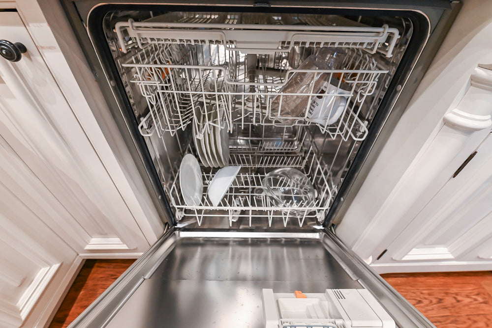 Quakermaid Traditional White Kitchen with Marble Countertops and Luxe Appliances